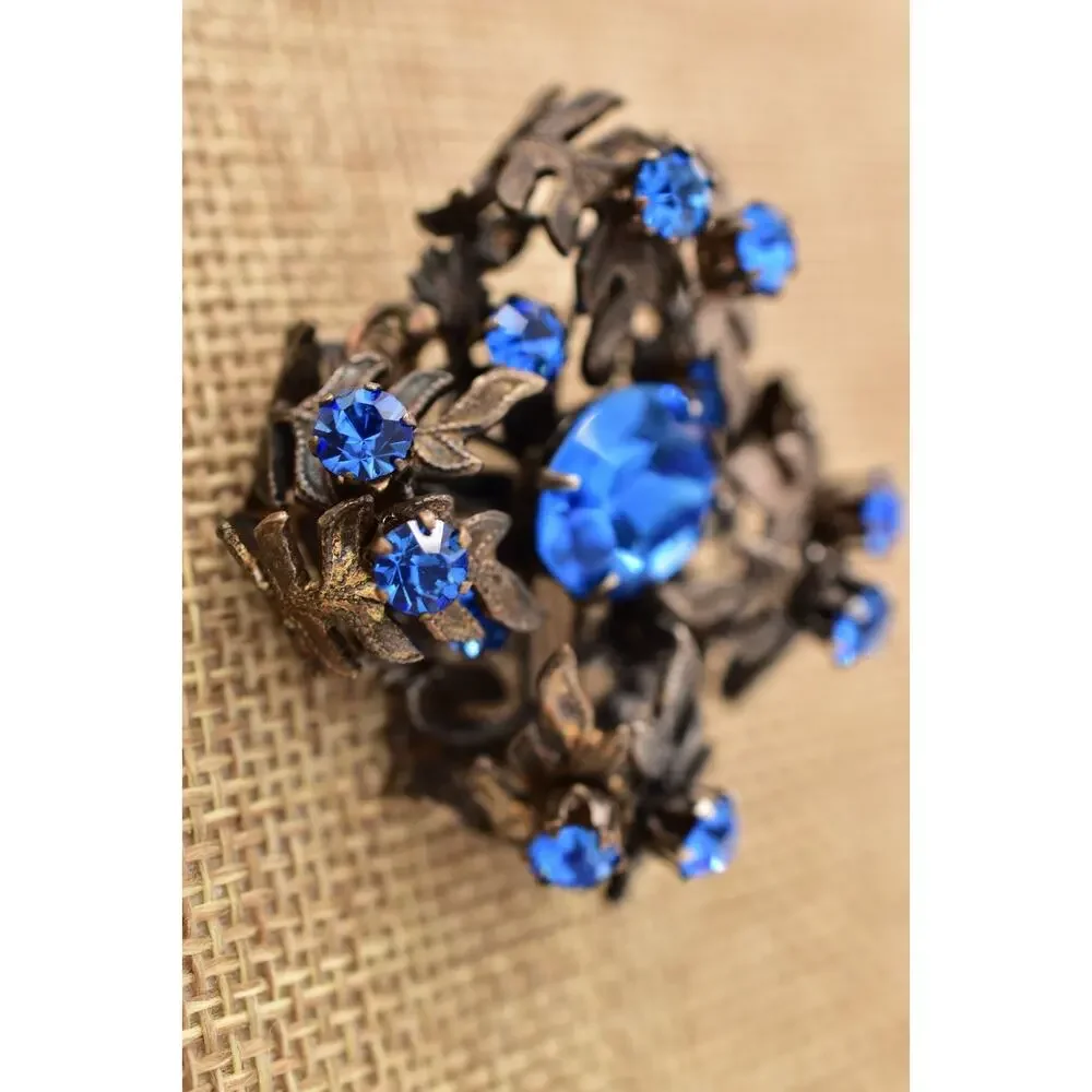 Vintage Austrian Blue Crystal Pin Brooch 3D Flower Gunmetal Tone 1960s BinBI
